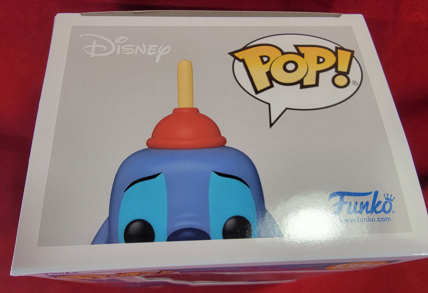 Stitch with plunger entertainment earth exclusive funko # 1354 (nib)