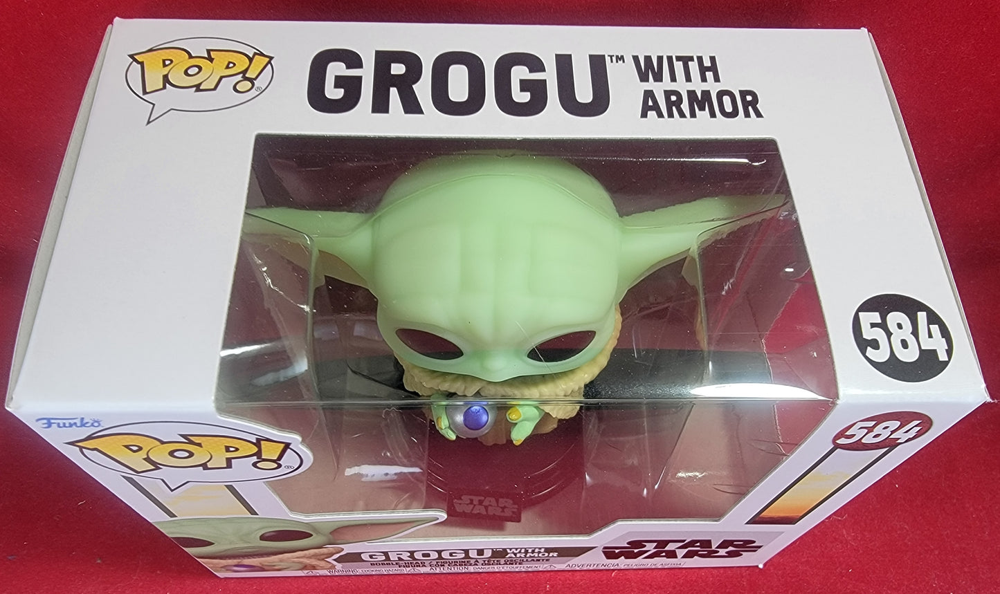 Grogu with Armor funko # 584 (nib)
With pop protector
