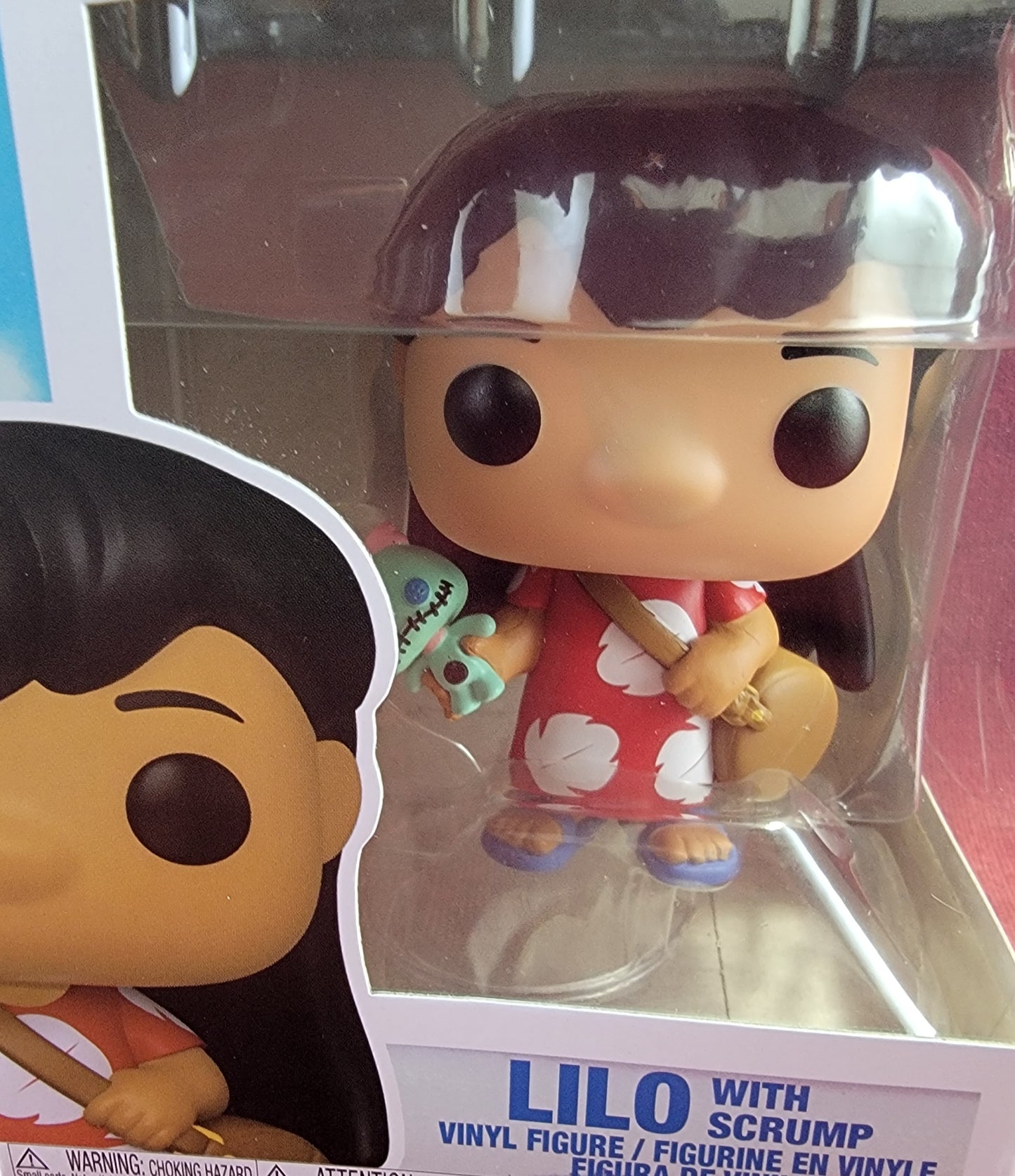 Lilo with scrump funko # 1043 (nib)
With pop protector