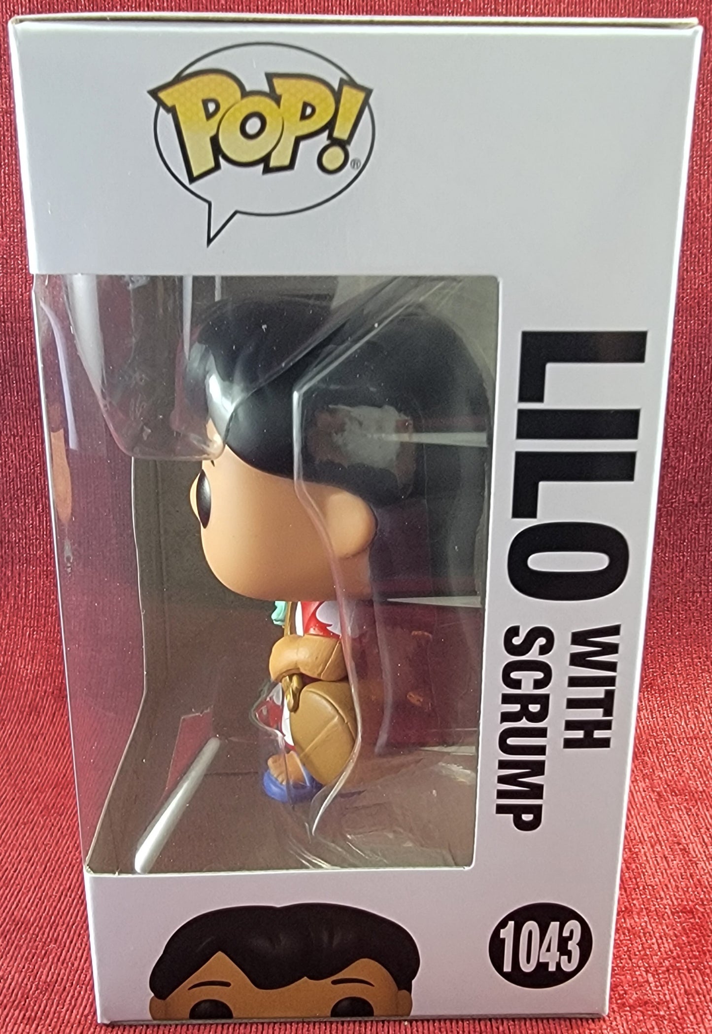 Lilo with scrump funko # 1043 (nib)
With pop protector