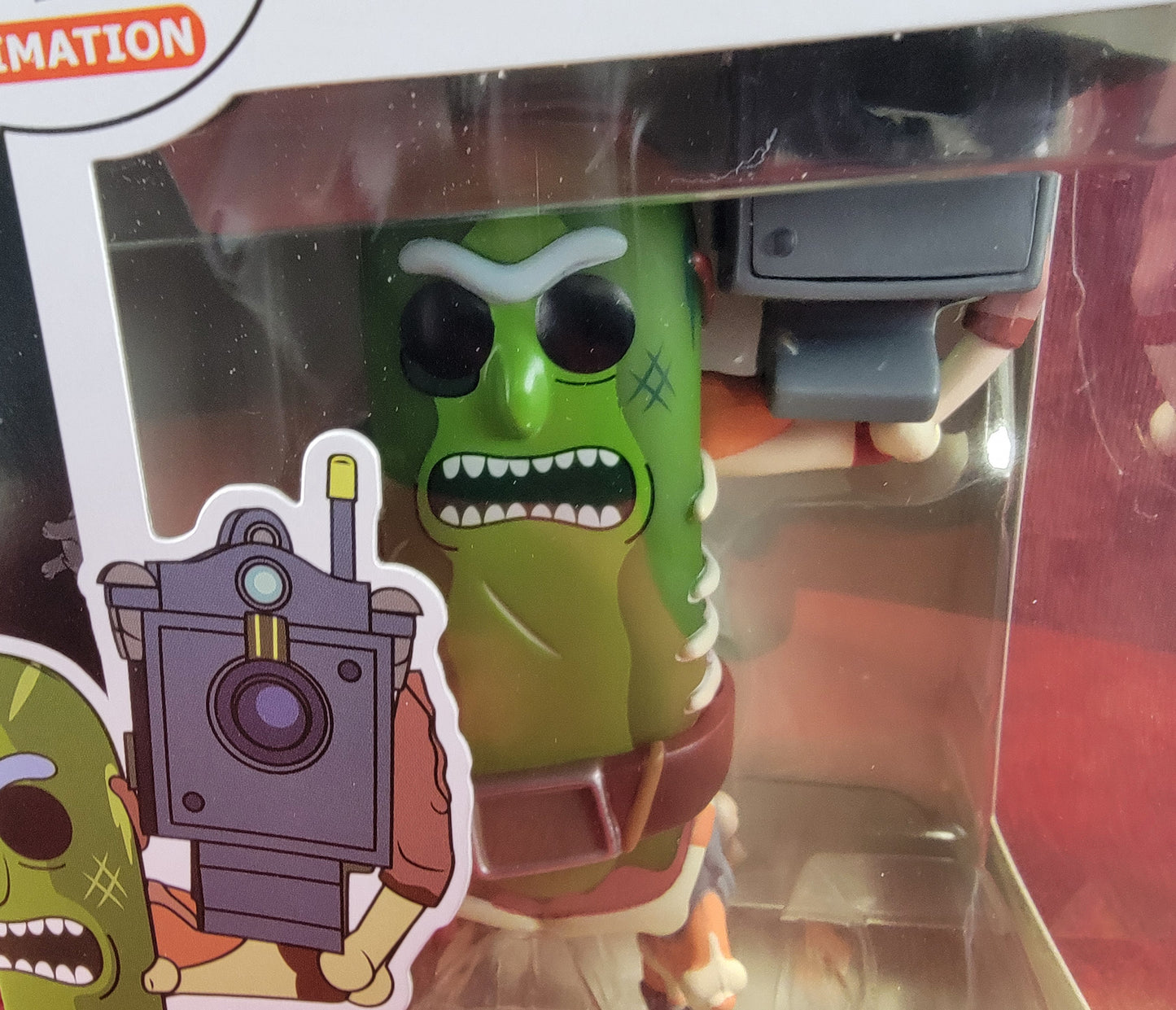 Pickle rick with laser funko # 332 (nib) 
With pop protector