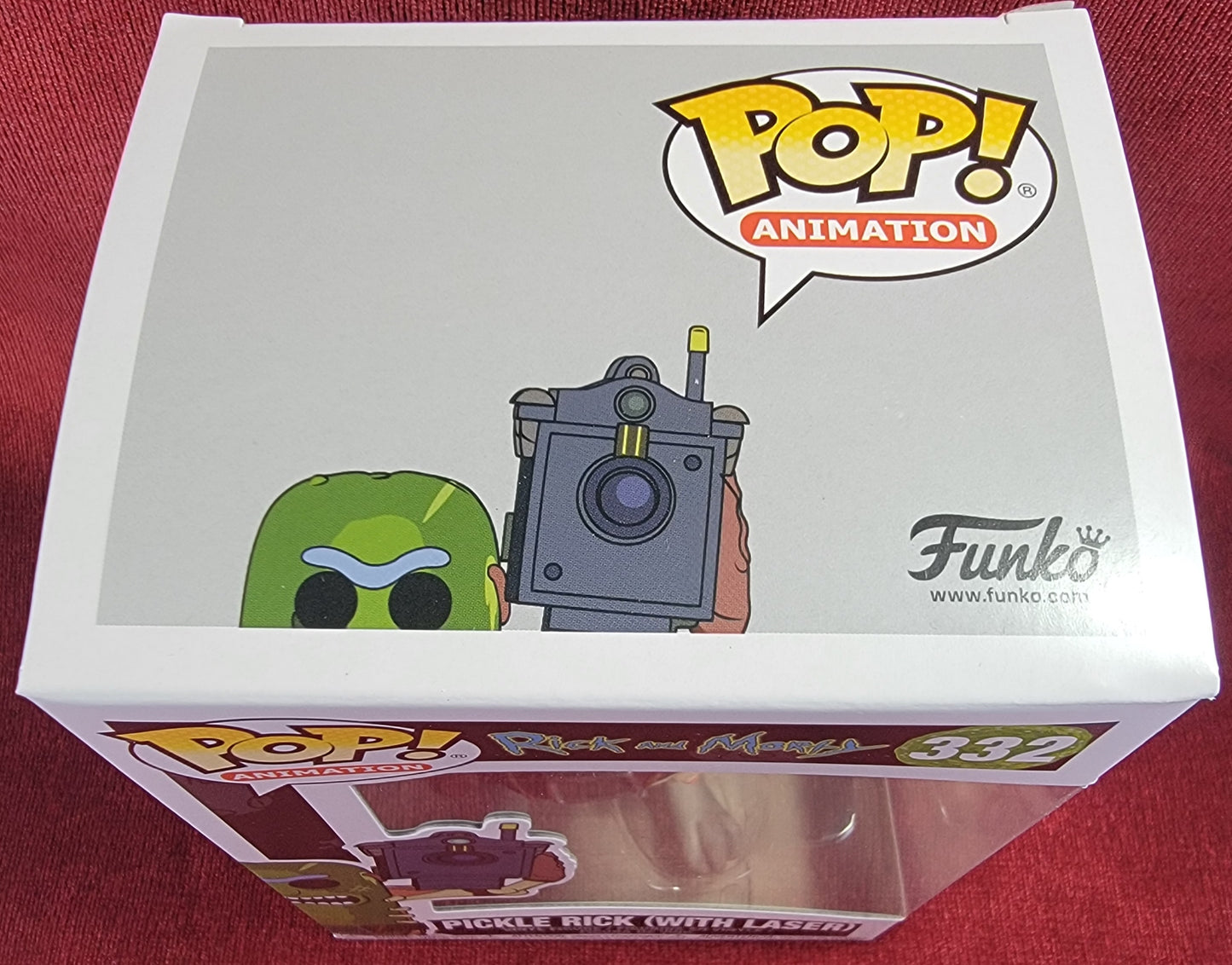 Pickle rick with laser funko # 332 (nib) 
With pop protector