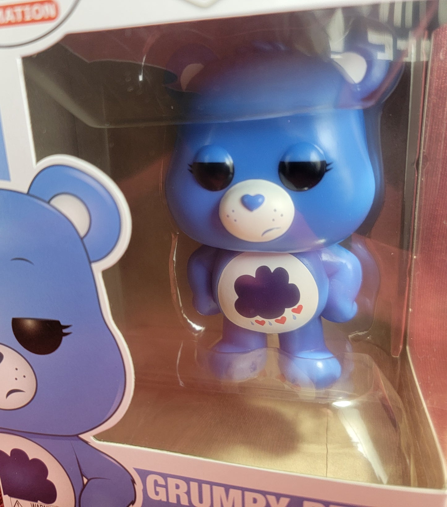 Grumpy bear funko # 353 (nib)
With pop protector