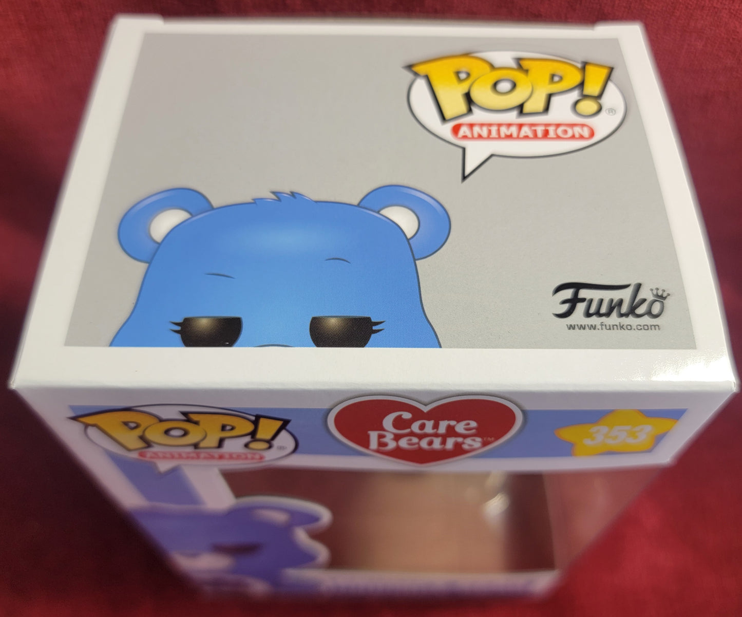 Grumpy bear funko # 353 (nib)
With pop protector