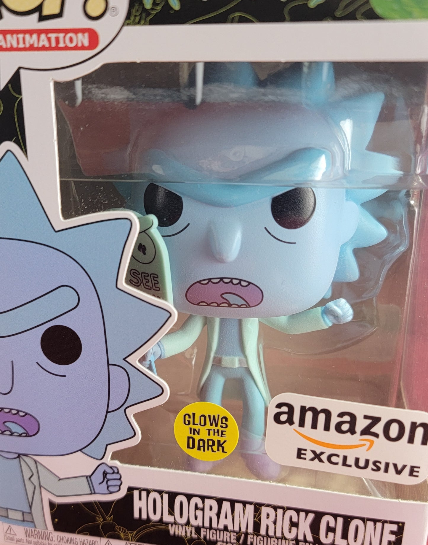 Hologram Rick Clone amazon exclusive funko # 665 (nib)
With pop protector