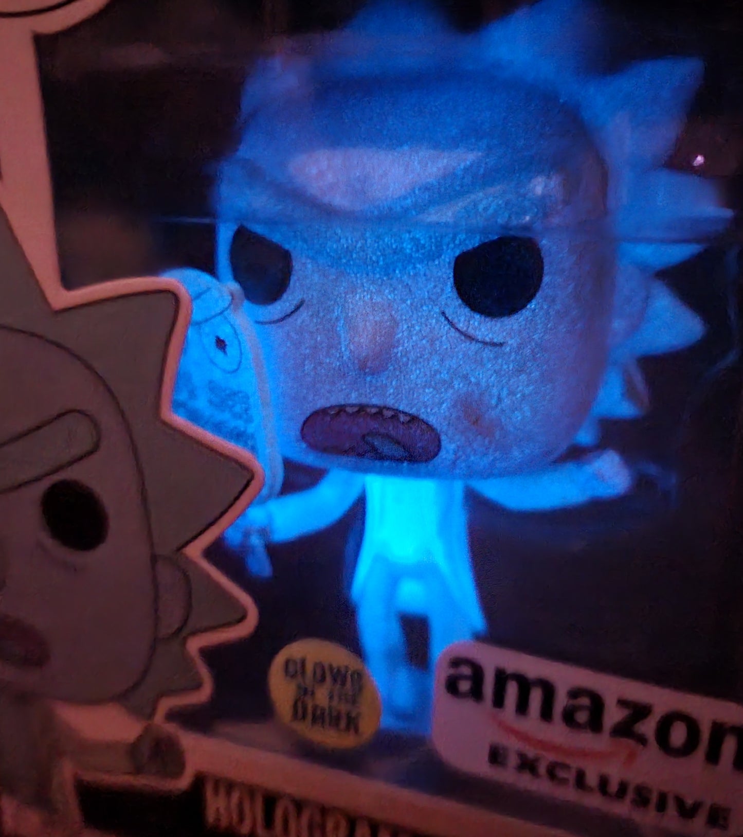 Hologram Rick Clone amazon exclusive funko # 665 (nib)
With pop protector