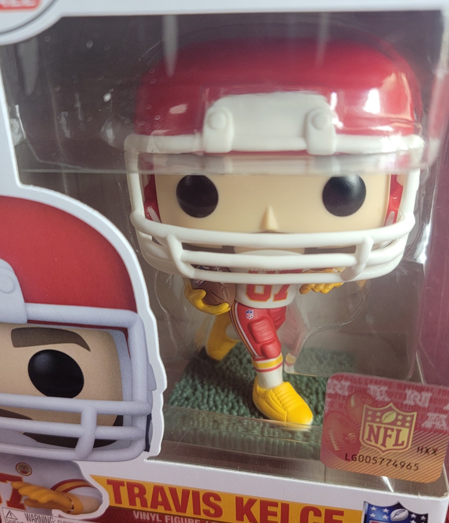 Travis Kelce funko # 257 (nib)
With pop protector