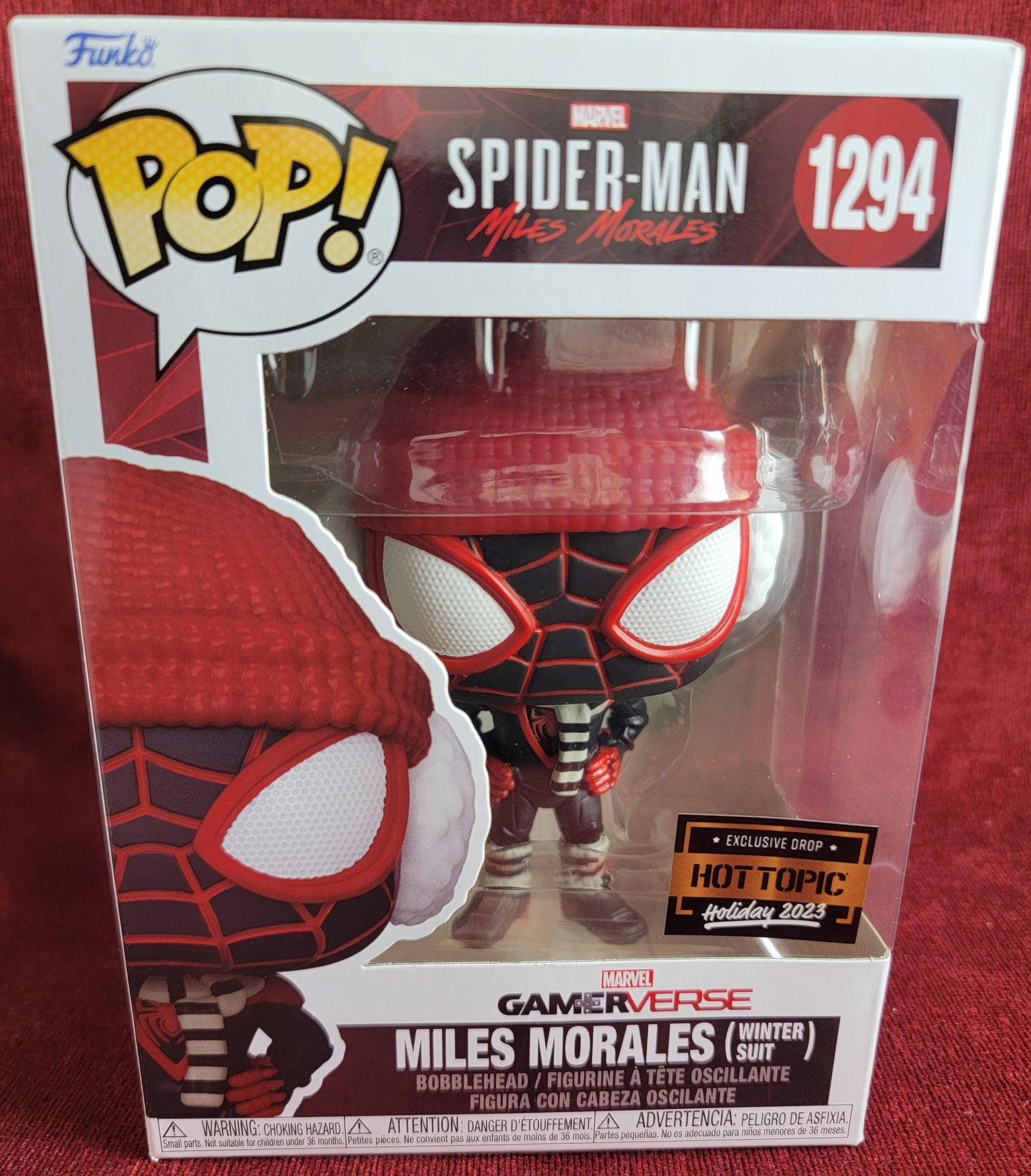 Miles Morales winter hot topic exclusive  funko # 1294 (nib) 
With pop protector