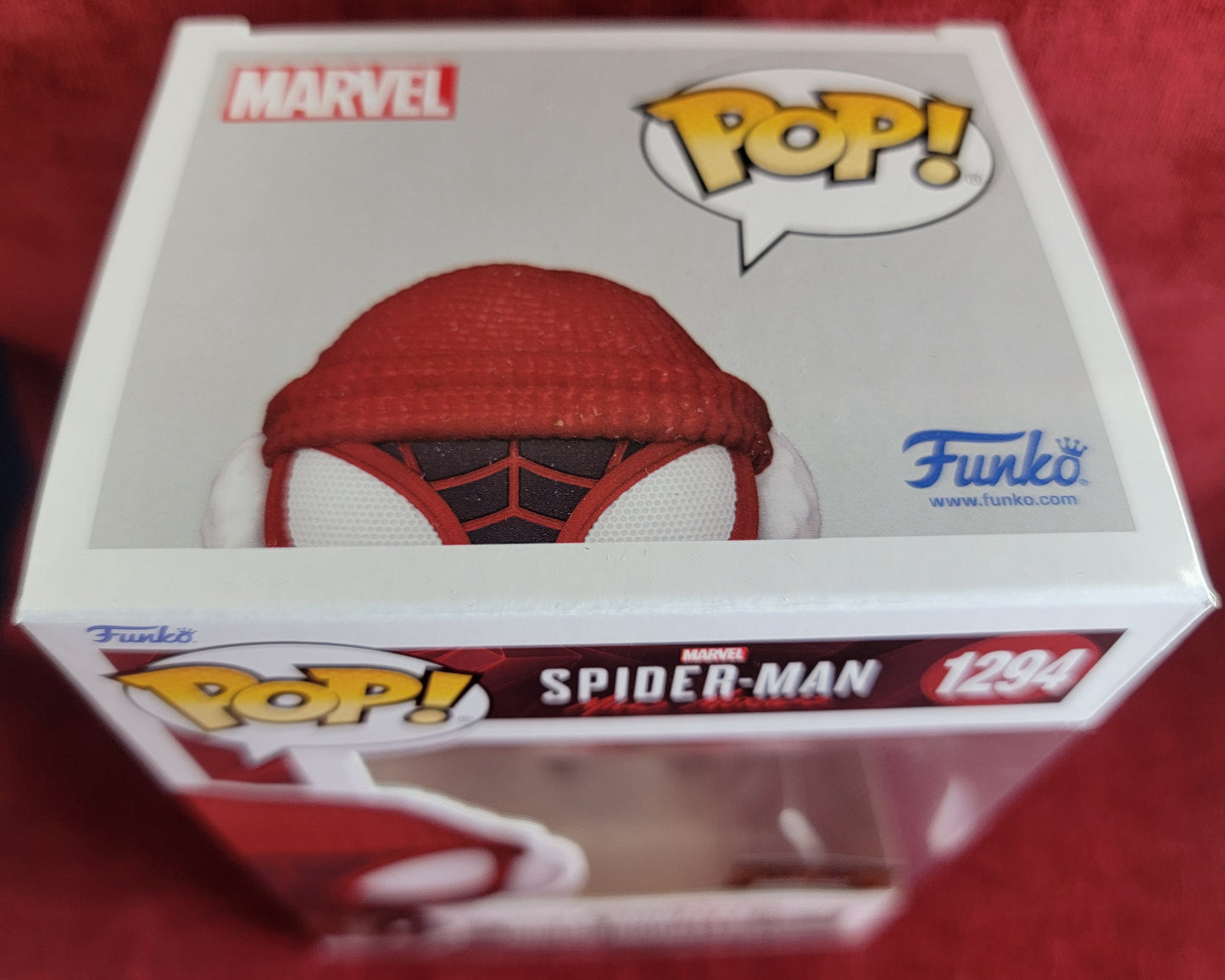 Miles Morales winter hot topic exclusive  funko # 1294 (nib) 
With pop protector