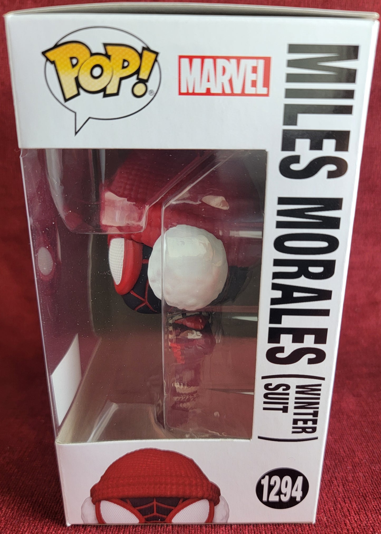 Miles Morales winter hot topic exclusive  funko # 1294 (nib) 
With pop protector