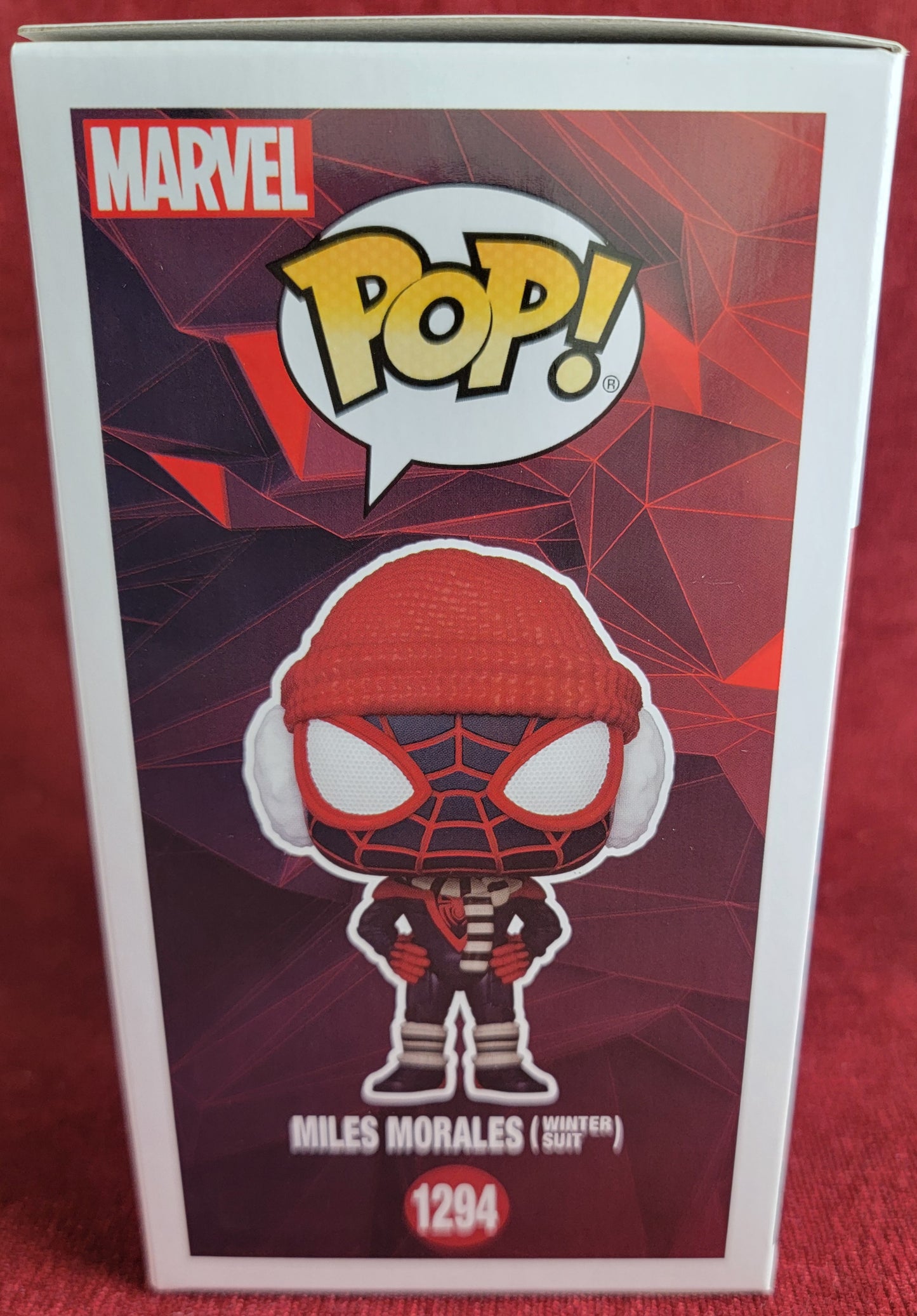 Miles Morales winter hot topic exclusive  funko # 1294 (nib) 
With pop protector