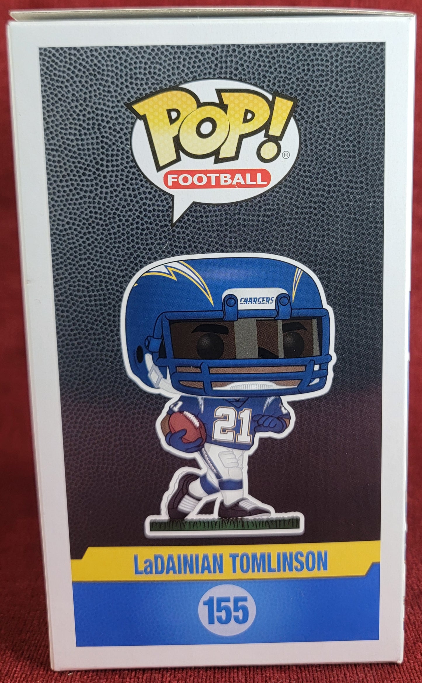 Ladainian Tomlinson funko # 155 (nib)
With pop protector