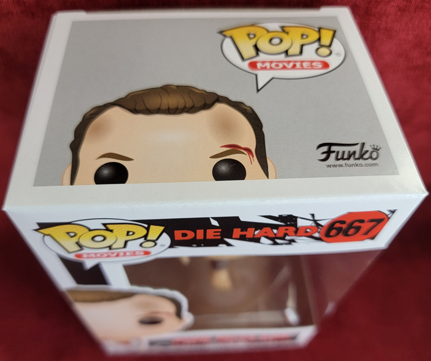 John McClane funko # 667 (nib)
With pop protector