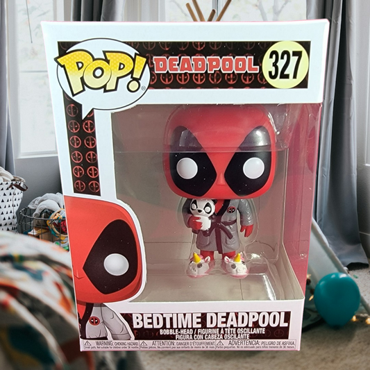 Bedtime Deadpool funko # 327 (nib)
With pop protector