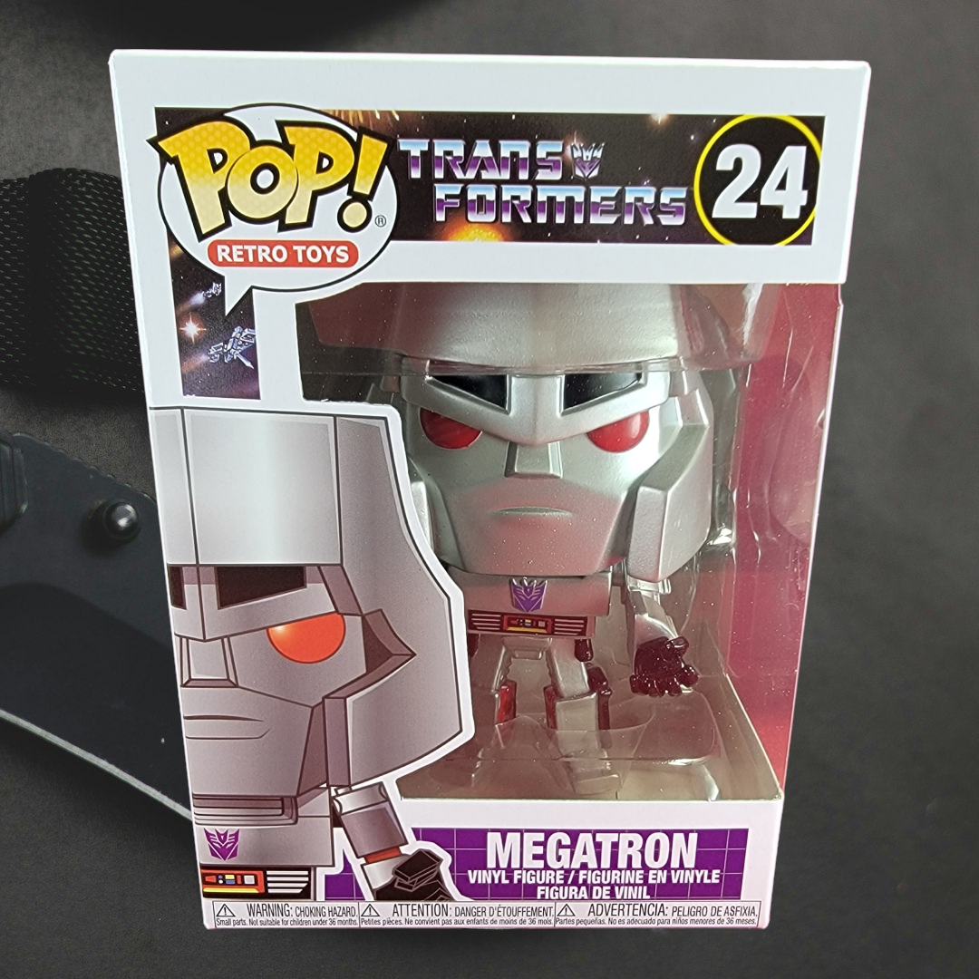 Megatron funko # 24 (nib) 
With pop protector