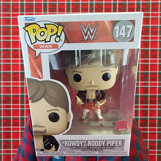 "Rowdy" Roddy Piper funko # 147 (nib)
With pop protector