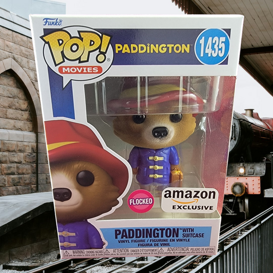 Paddington with suitcase amazon exclusive funko # 1435 (nib)
With pop protector