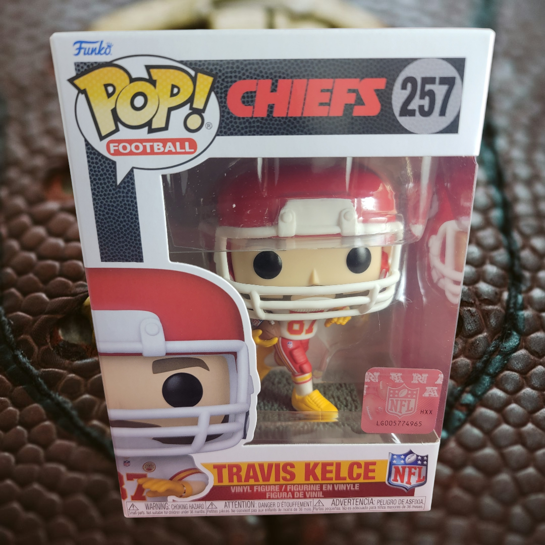 Travis Kelce funko # 257 (nib)
With pop protector