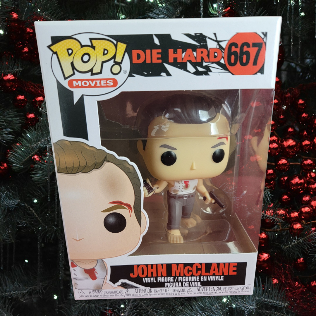 John McClane funko # 667 (nib)
With pop protector