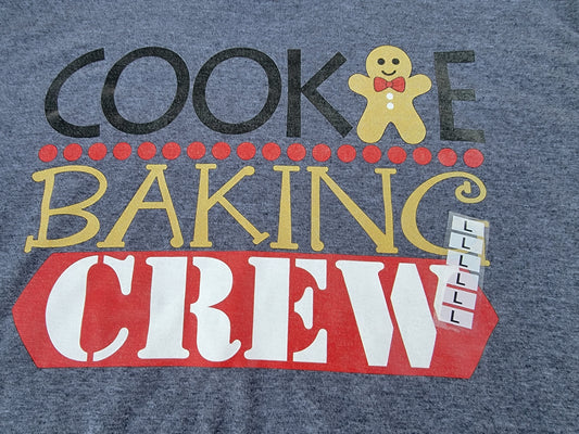 Cookie baking crew large t-shirt 
brand new large gildan softstyle ring spun gray t-shirt. shirt is in excellent condition with the original large sticker still stuck on the front.