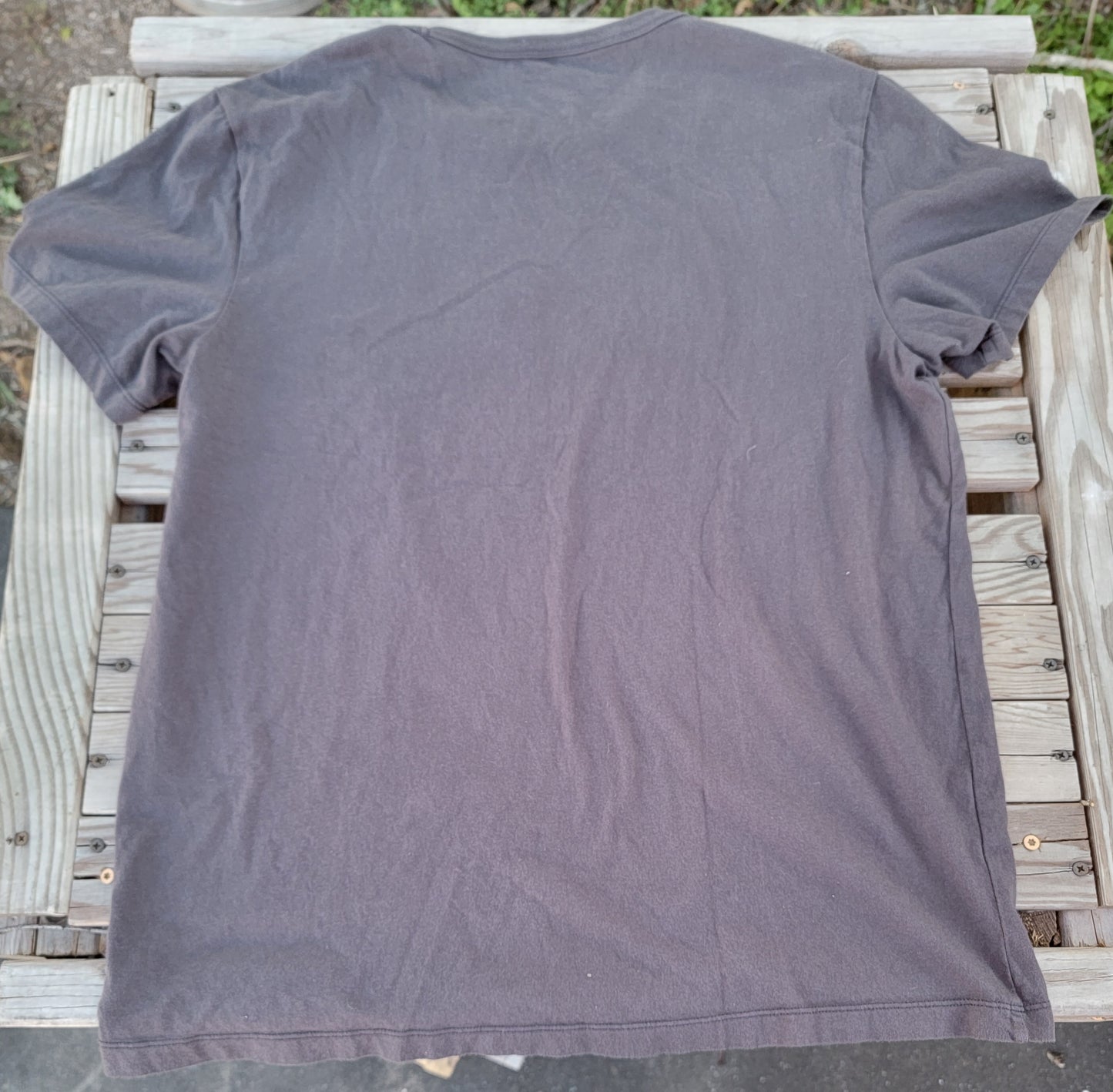 American Eagle large t-shirt 
brand new grey and white eagle shirt with the words elevated nomadic goods. t-shirt is on new condition.